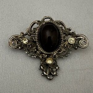 Vintage Germany silver tone brooch with black oval cabochon